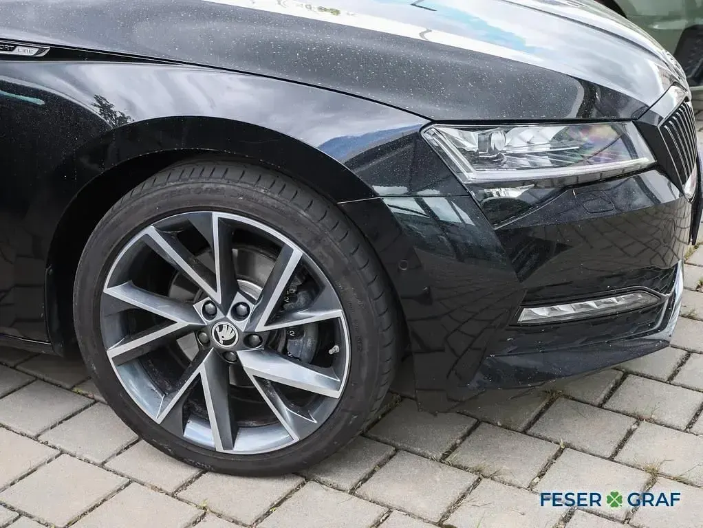 Gebraucht Skoda Superb SportLine 200 PS (147 kW) 2023 Black magic perleffekt Kombi