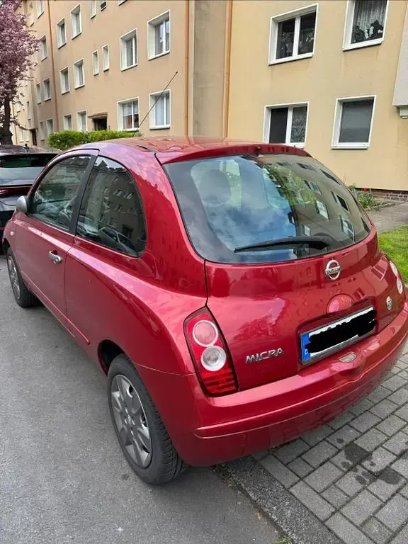 Gebraucht Nissan Micra 65 PS (47 kW) 2009 Rot Limousine