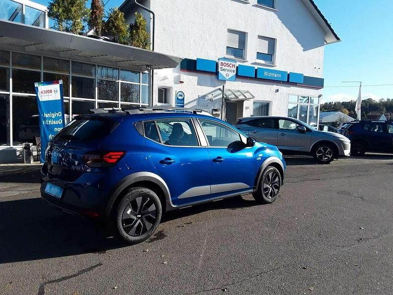 Gebraucht Dacia Sandero Expression 91 PS (66 kW) 2024 Iron blue metallic Kleinwagen