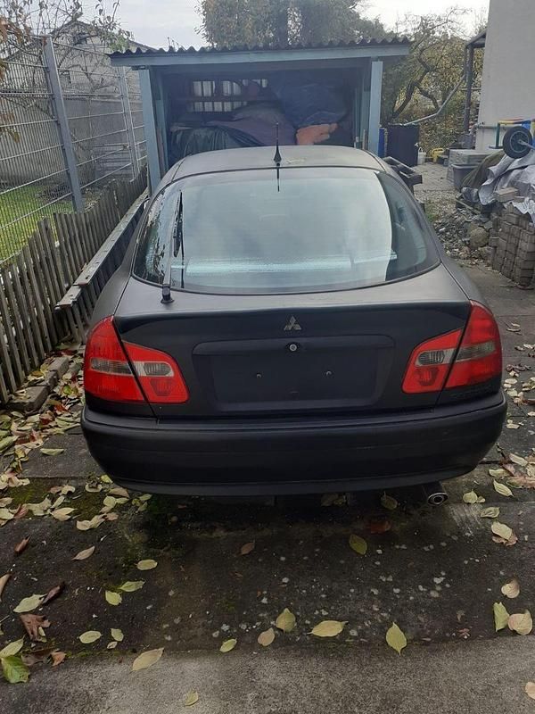 Gebraucht Mitsubishi Carisma 103 PS (75 kW) 2004 Schwarz Limousine