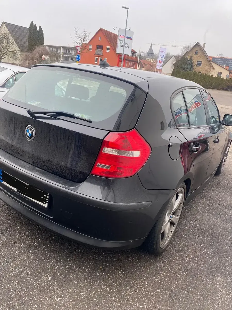 Second-hand BMW 116 122 CP (89 kW) 2010 Negru Hatchback
