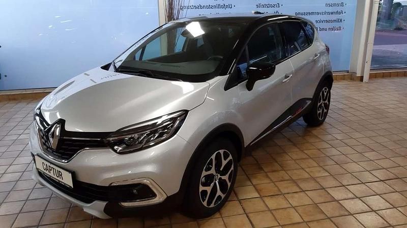 Grau d69 + schwarz gne Gebraucht 2019 Renault Captur Intens SUV | 14.800 € (Fairer Preis) - Bild 1/4
