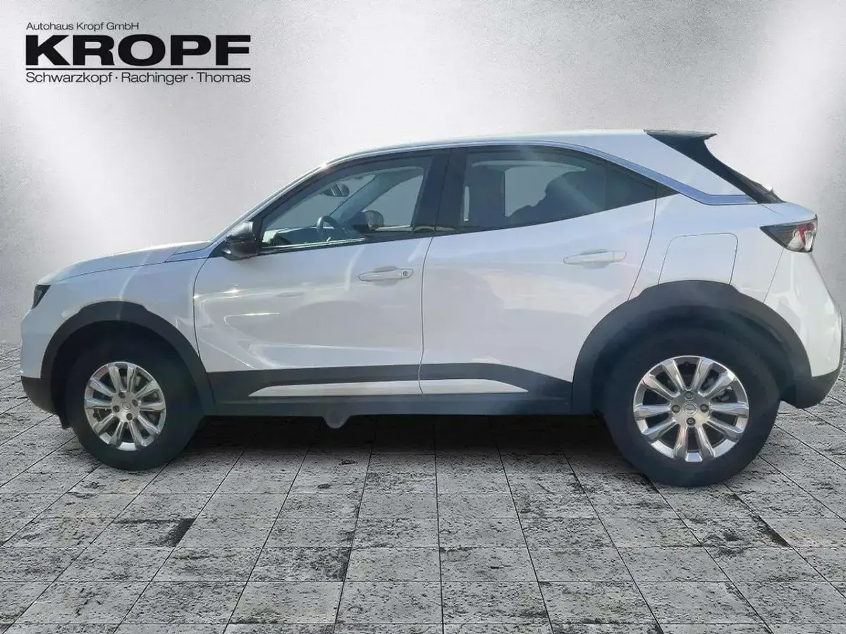 Gebraucht Opel Mokka Enjoy 131 PS (96 kW) 2023 Lack weiss banquise/typ aussen SUV