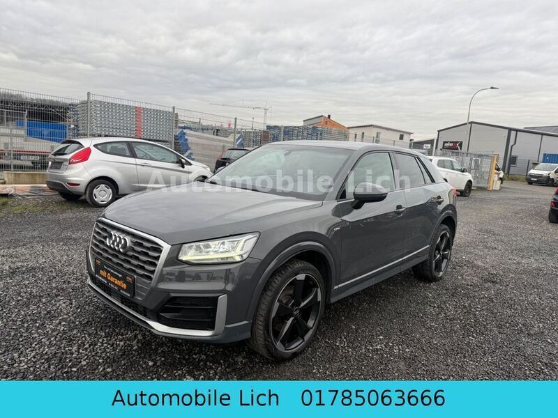 Grau Gebraucht 2017 Audi Q2 Design SUV | 15.799 € (Fairer Preis) - Bild 1/4