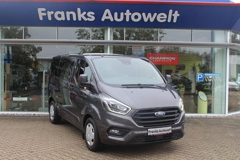 Grau Gebraucht 2018 Ford Tourneo Custom Van | 27.950 € (Etwas zu teuer) - Bild 1/4