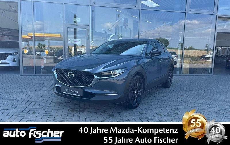 Polymetal gray Gebraucht 2024 Mazda CX-30 Homura-Line SUV | 28.590 € - Bild 1/4