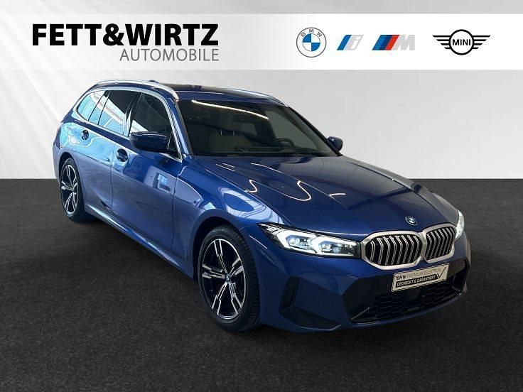 M portimao blau metallic Gebraucht 2024 BMW 330e M Sport Kombi | 39.900 € (Superpreis) - Bild 1/3