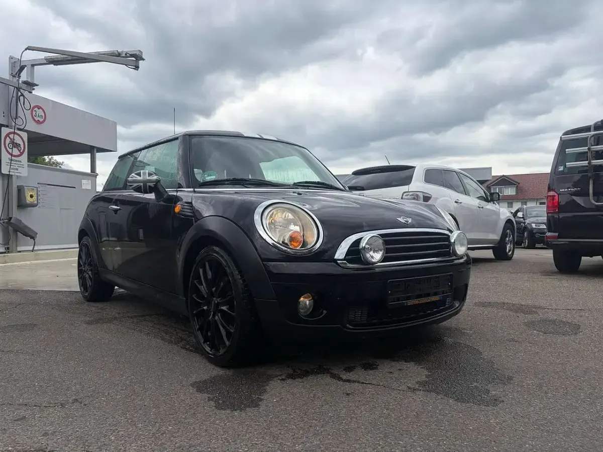 Gebraucht Mini ONE 75 PS (55 kW) 2010 Midnight black metallic Kleinwagen