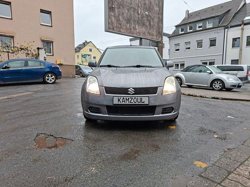 Grau Gebraucht 2008 Suzuki Swift Kleinwagen | 2.790 € (Etwas zu teuer) - Bild 1/4