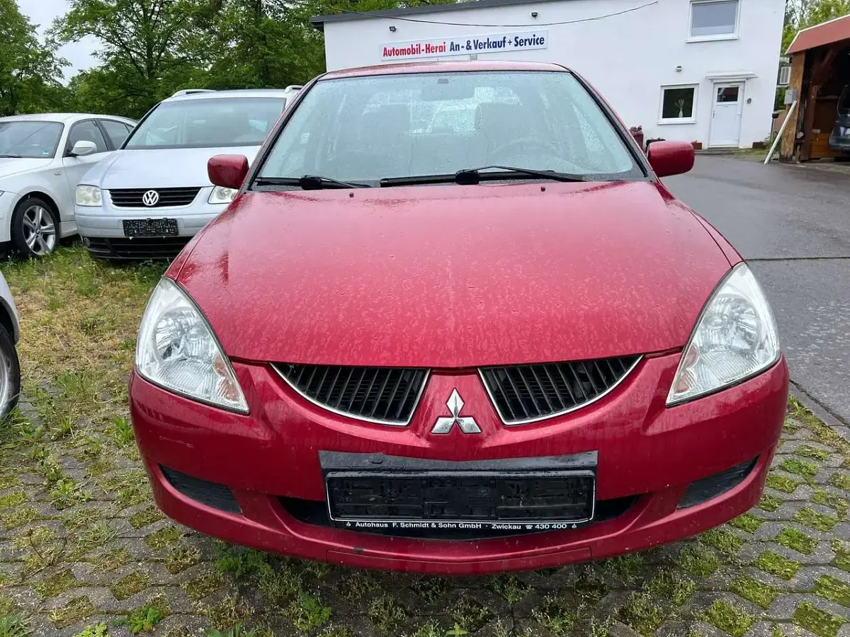 Second-hand Mitsubishi Lancer Comfort Edition 98 CP (72 kW) 2004 Roșu Berlinǎ