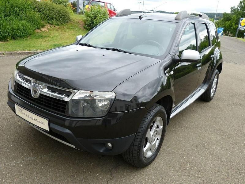 Perlmuttschwarz metallic Gebraucht 2011 Dacia Duster Prestige SUV | 6.499 € (Fairer Preis) - Bild 1/4