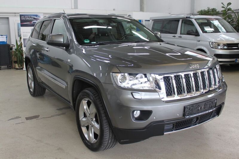 Grau Gebraucht 2013 Jeep Grand Cherokee Overland SUV | 23.900 € (Fairer Preis) - Bild 1/4