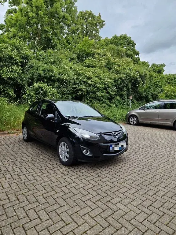 Gebraucht Mazda 2 Active 75 PS (55 kW) 2010 Schwarz Kleinwagen
