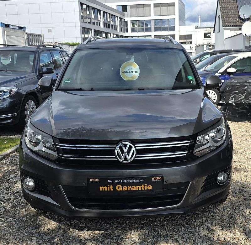 Grau Gebraucht 2014 VW Tiguan Cup SUV | 11.500 € (Fairer Preis) - Bild 1/4