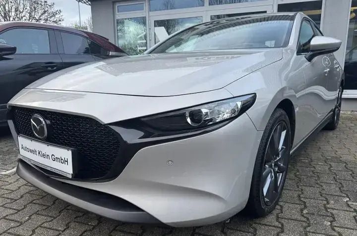 Silber Gebraucht 2023 Mazda 3 Exclusive-Line Kleinwagen | 24.790 € (Fairer Preis) - Bild 1/4