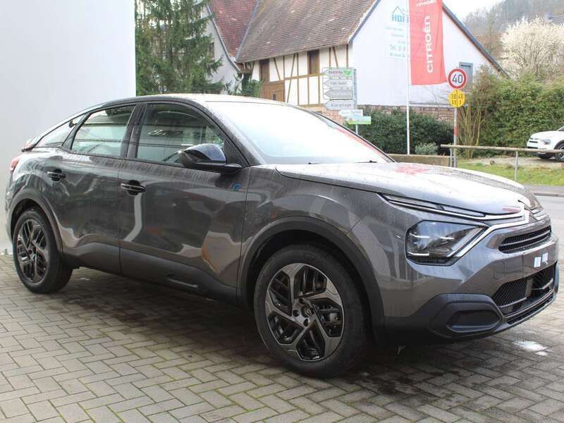 Gebraucht Citroën e-C4 100 kW (136 PS) 2024 Lackierung platiniumgrau Kleinwagen
