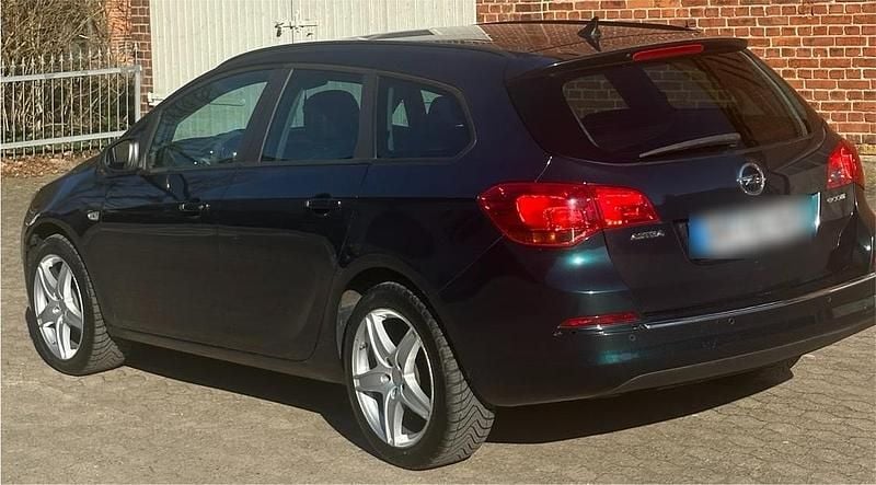 Gebraucht Opel Astra 110 PS (80 kW) 2016 Grün Kombi