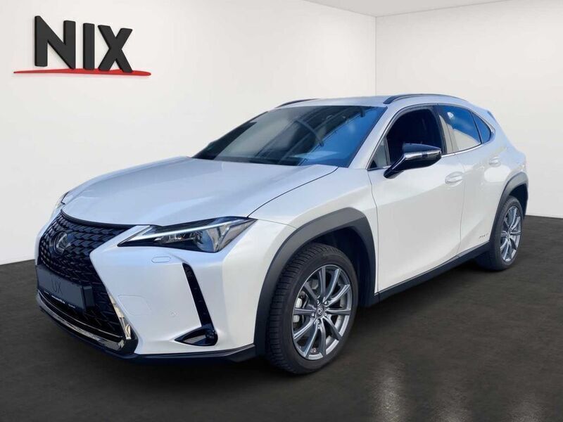 Titaniumweiß Gebraucht 2022 Lexus UX 250h SUV | 35.990 € - Bild 1/4