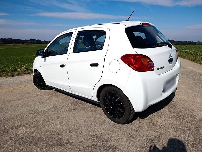 Second-hand Mitsubishi Space Star 70 CP (51 kW) 2015 Alb Hatchback