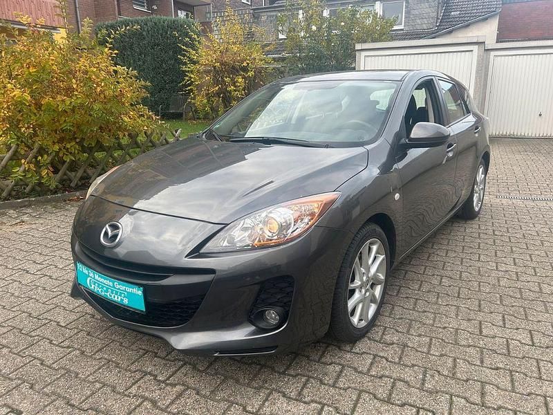 Grau Gebraucht 2012 Mazda 3 Edition Limousine | 5.950 € (Fairer Preis) - Bild 1/4