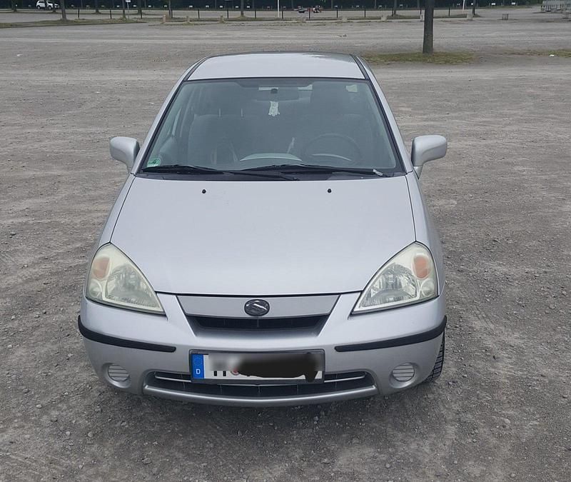 Grau Gebraucht 2002 Suzuki Liana Limousine | 1.000 € (Fairer Preis) - Bild 1/4