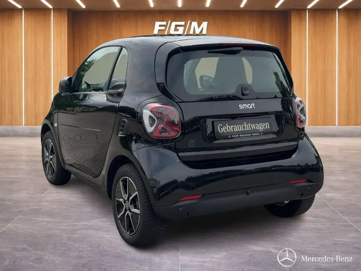 Gebraucht Smart ForTwo Electric Drive Passion 60 kW (82 PS) 2024 Bodypanels in black Coupé