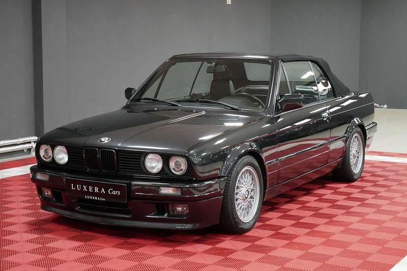 Schwarz Gebraucht 1990 BMW 325 Cabriolet Performance Cabrio | 49.990 € - Bild 1/4