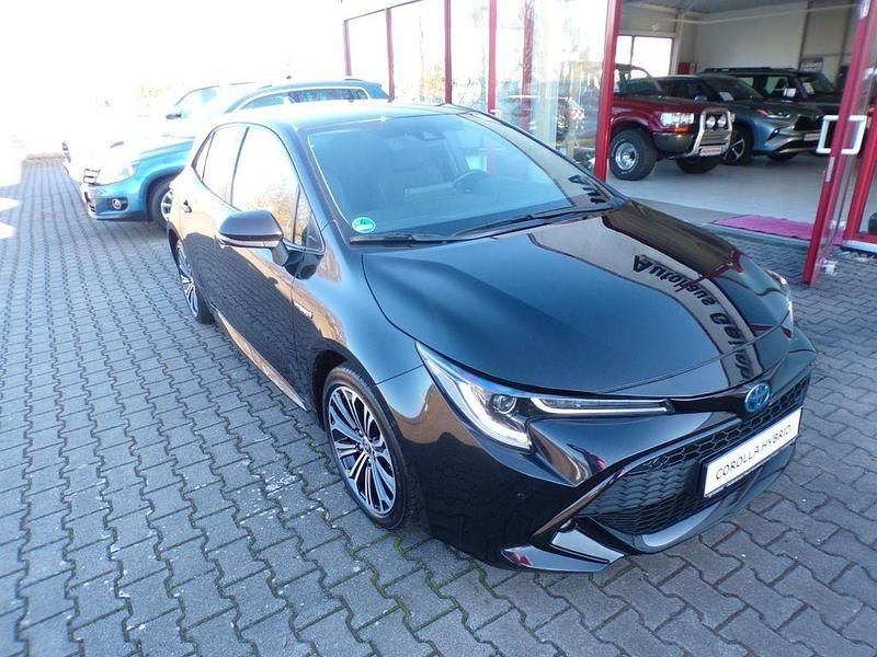 Gebraucht Toyota Corolla Hybrid Club 122 PS (89 kW) 2019 Schwarz Limousine