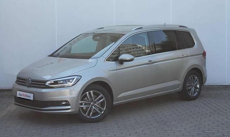 Ivory silver metallic Gebraucht 2024 VW Touran Comfortline Van / Kleinbus | 40.944 € - Bild 1/4