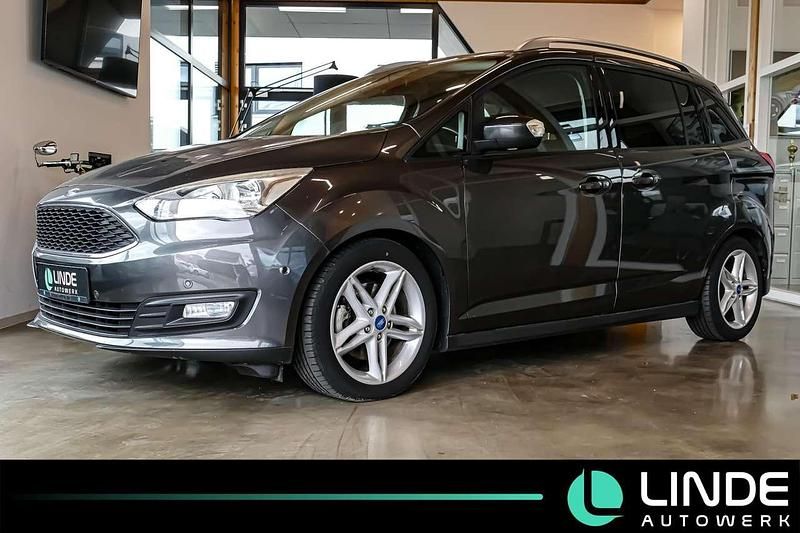 Magneticgrau (metallic) Gebraucht 2016 Ford Grand C-Max Business Edition Van / Kleinbus | 7.790 € (Guter Preis) - Bild 1/4