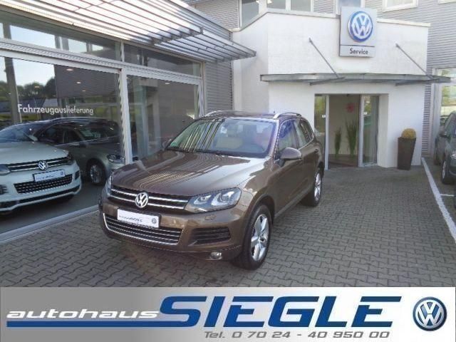 Braun metallic Gebraucht 2012 VW Touareg SUV | 27.490 € - Bild 1/4
