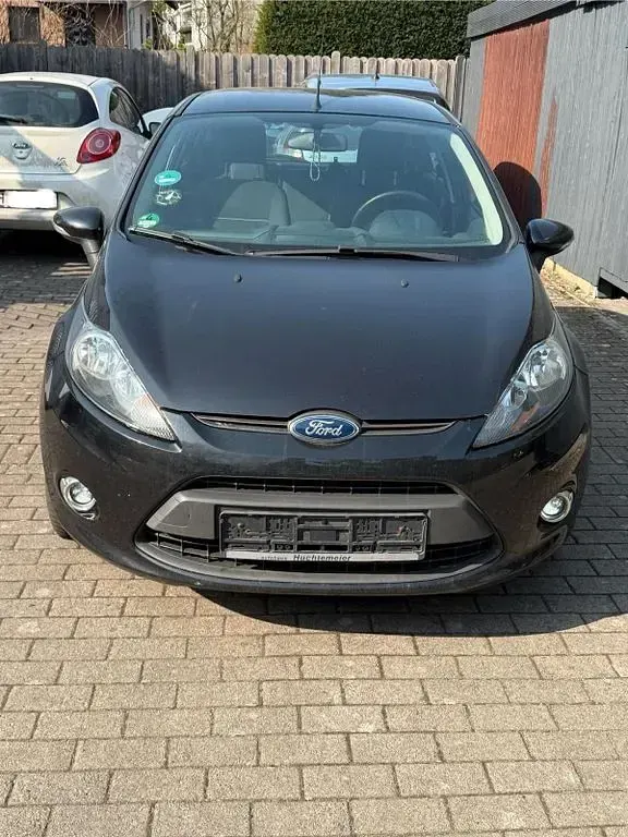 Gebraucht Ford Fiesta 95 PS (69 kW) 2012 Schwarz Limousine