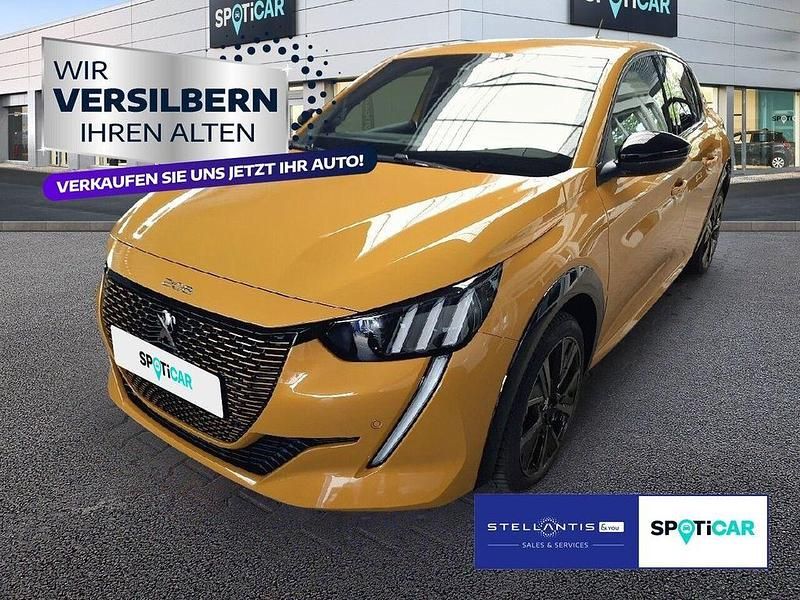 Gelb Gebraucht 2023 Peugeot e-208 GT Kleinwagen | 20.890 € (Fairer Preis) - Bild 1/4