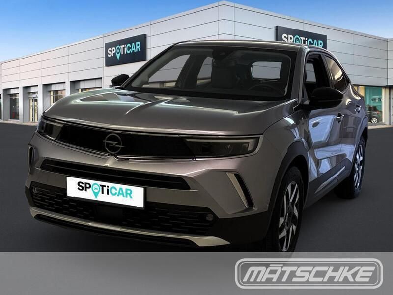 Grau Gebraucht 2022 Opel Mokka-e Elegance SUV | 25.900 € (Teuer) - Bild 1/3