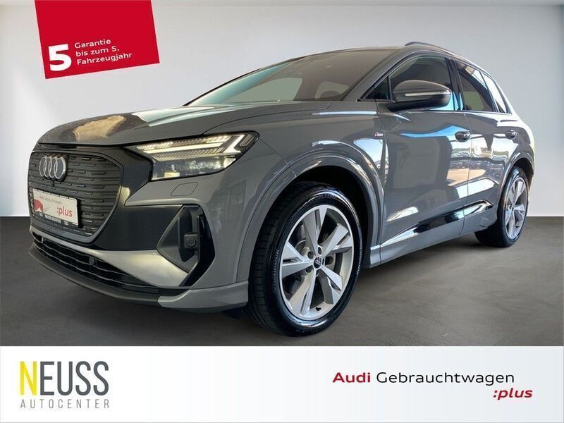 Grau Gebraucht 2024 Audi Q4 e-tron S-Line SUV | 48.750 € (Superpreis) - Bild 1/2