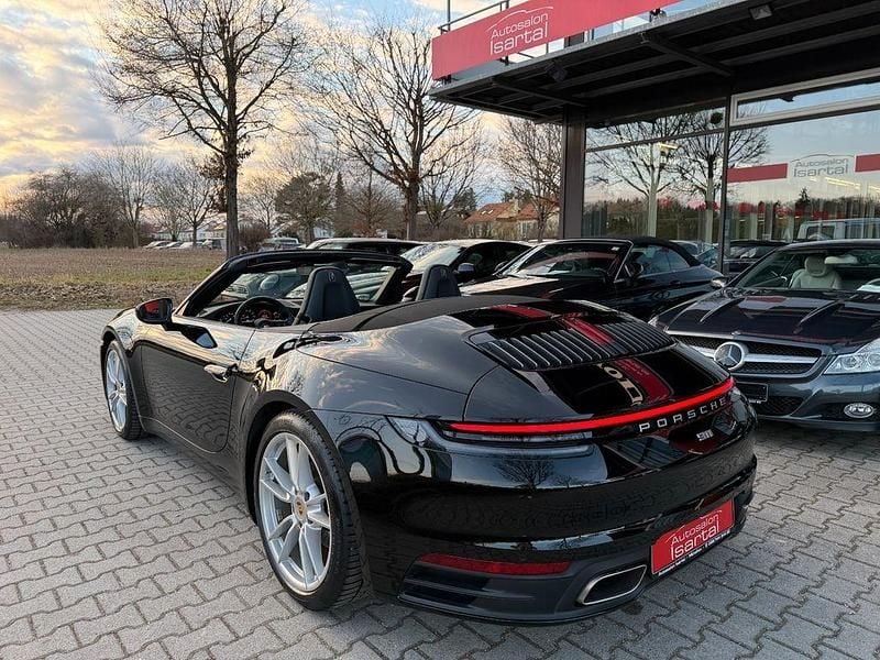 Gebraucht Porsche 911 Carrera 4 Cabriolet 385 PS (283 kW) 2023 Tiefschwarz Cabrio