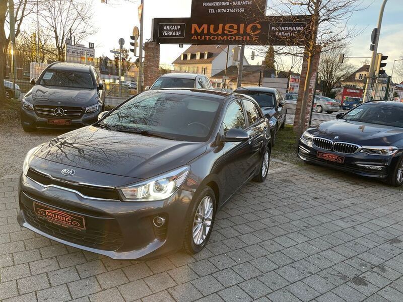 Grau Gebraucht 2018 Kia Rio DREAM-TEAM Edition Kleinwagen | 10.950 € (Fairer Preis) - Bild 1/4