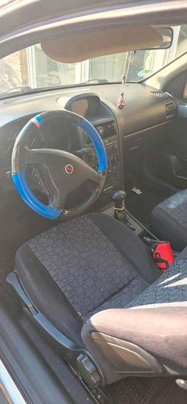 Używany Opel Corsa 110 KM (80 kW) 2000 Szary Coupe