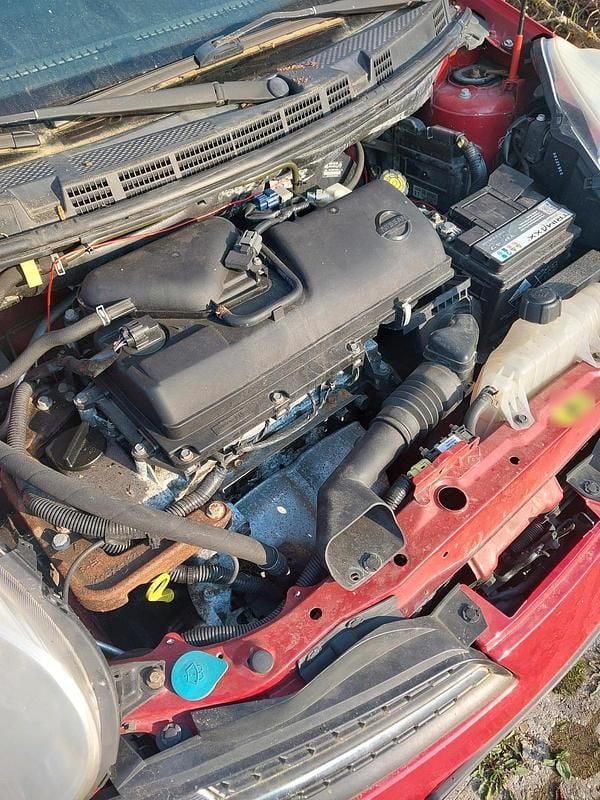 Usata Nissan Micra 98 CV (72 kW) 2012 Rosso Utilitaria