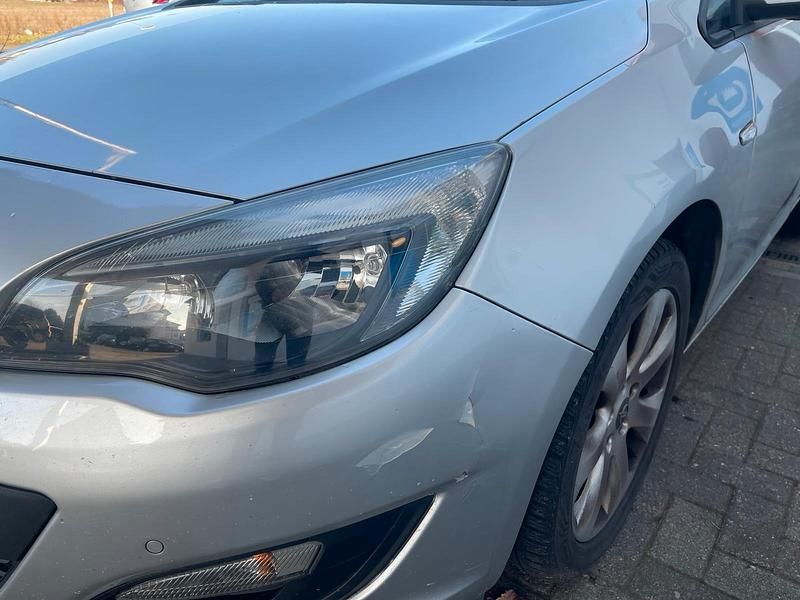 Gebraucht Opel Astra 110 PS (80 kW) 2013 Grau Kombi