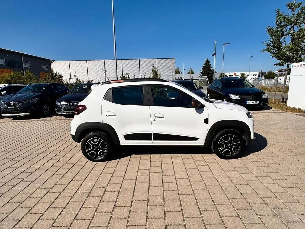 Gebraucht Dacia Spring Extreme 47 kW (65 PS) 2023 Weiß Kleinwagen