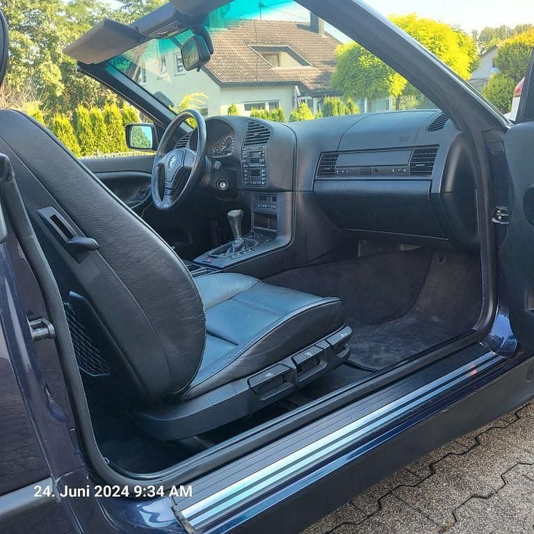 Gebraucht BMW 318 Cabriolet 116 PS (85 kW) 1997 Violet Cabrio