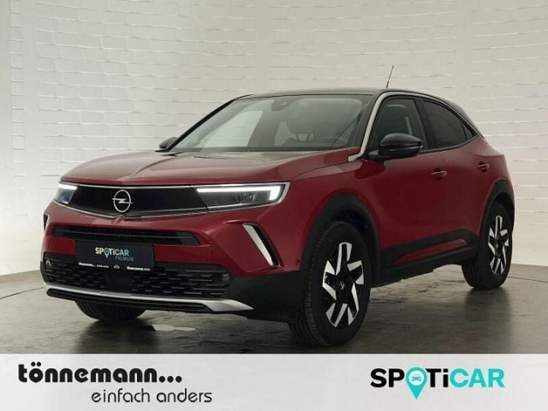 Kosmos rot Gebraucht 2023 Opel Mokka-e Elegance SUV | 20.824 € (Fairer Preis) - Bild 1/3