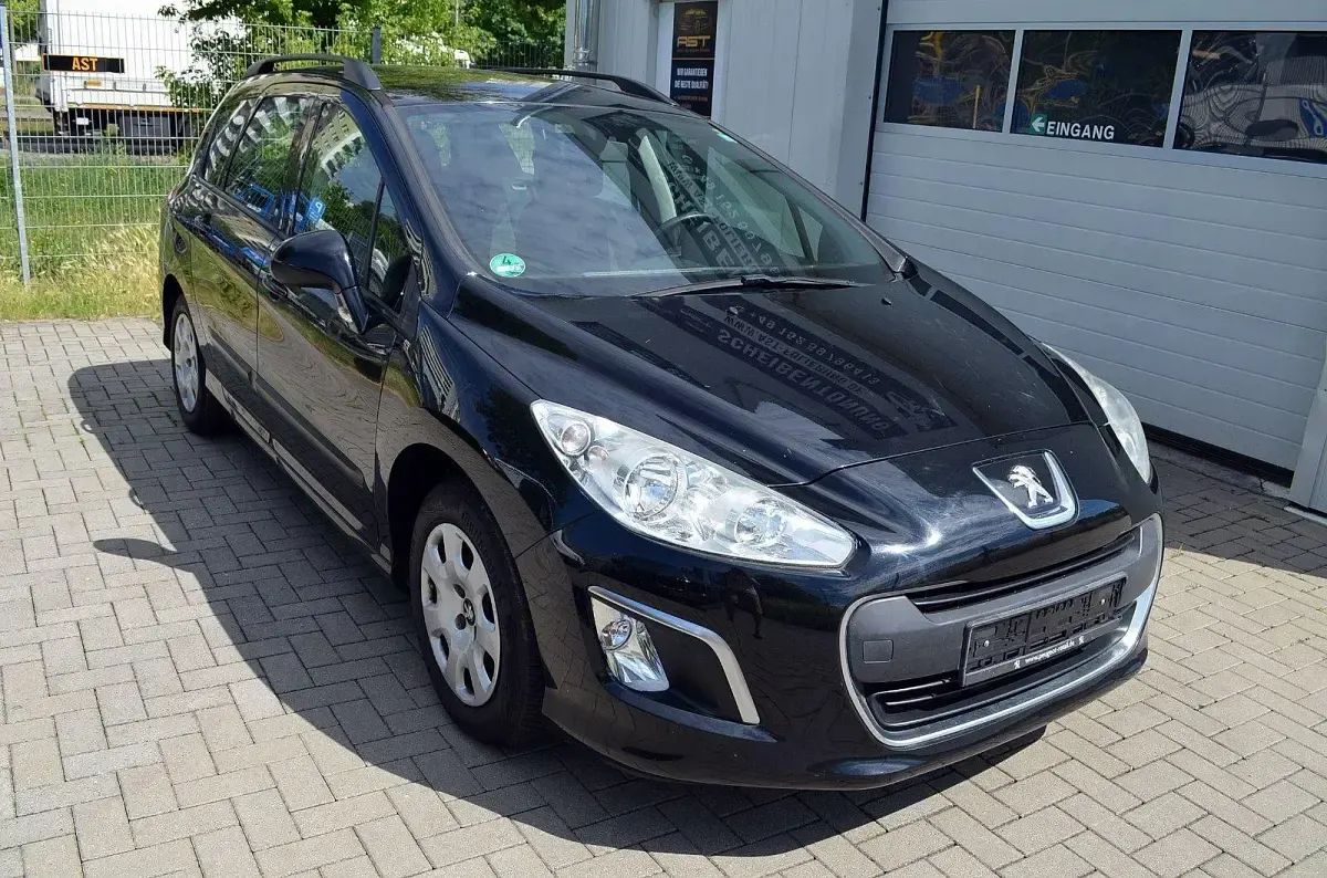 Gebraucht Peugeot 308 SW 92 PS (67 kW) 2011 Schwarz Kombi