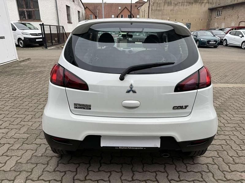 Gebraucht Mitsubishi Colt Motion 75 PS (55 kW) 2012 Porcelain white Kleinwagen