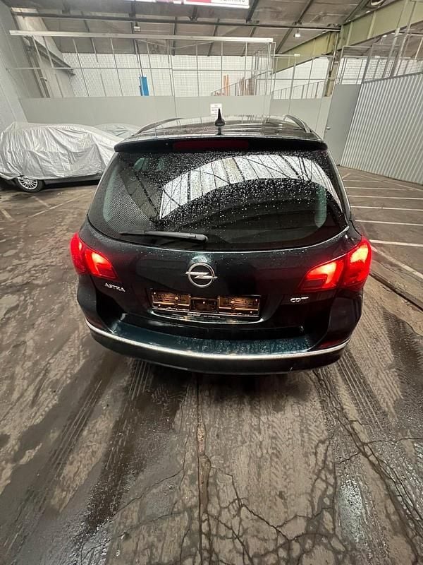 Gebraucht Opel Astra 110 PS (80 kW) 2016 Grün Kombi