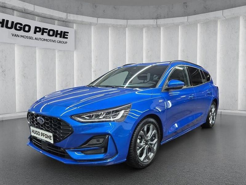 Desert island blue metallic Gebraucht 2024 Ford Focus ST-Line X Kombi | 28.700 € (Teuer) - Bild 1/4