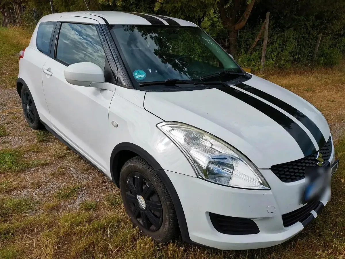 Gebraucht Suzuki Swift 94 PS (69 kW) 2012 Weiß Kleinwagen