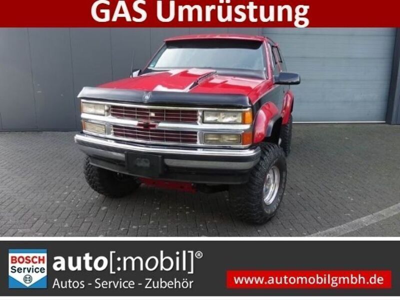 Rot (metallic) Gebraucht 1993 Chevrolet Tahoe SUV | 29.979 € - Bild 1/3