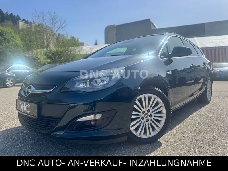 Grün Gebraucht 2015 Opel Astra Edition Kombi | 6.999 € (Guter Preis) - Bild 1/4